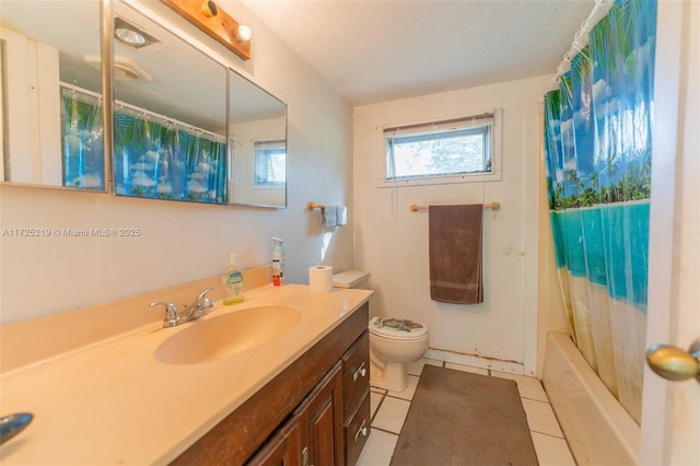 full bathroom featuring tile patterned flooring, vanity, shower / bath combination with curtain, and toilet