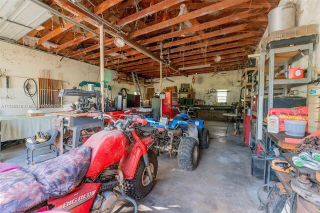 garage with a workshop area