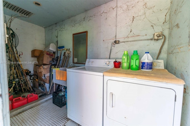 laundry area featuring independent washer and dryer