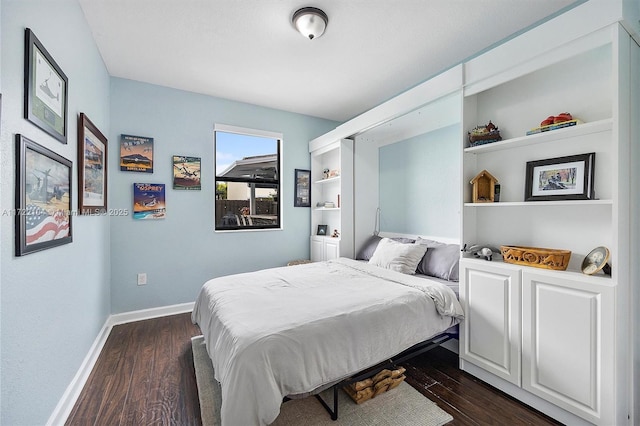 bedroom featuring dark hardwood / wood-style floors