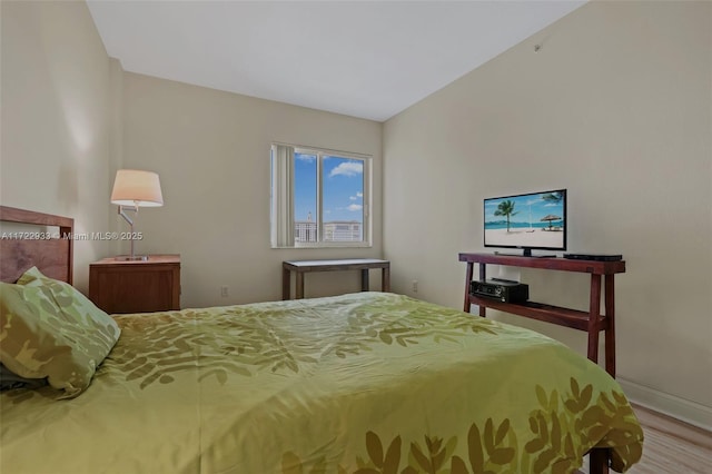 bedroom featuring hardwood / wood-style flooring