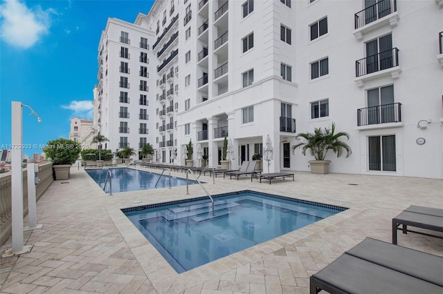 view of pool with a patio area