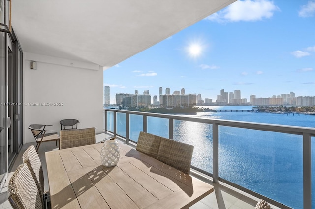 balcony featuring a water view