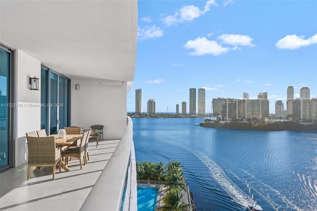 balcony featuring a water view