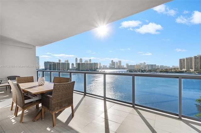 balcony featuring a water view