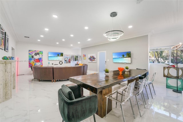 dining space featuring crown molding