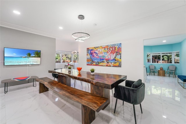 dining room with ornamental molding