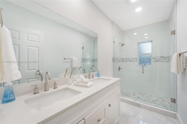 bathroom with vanity and walk in shower