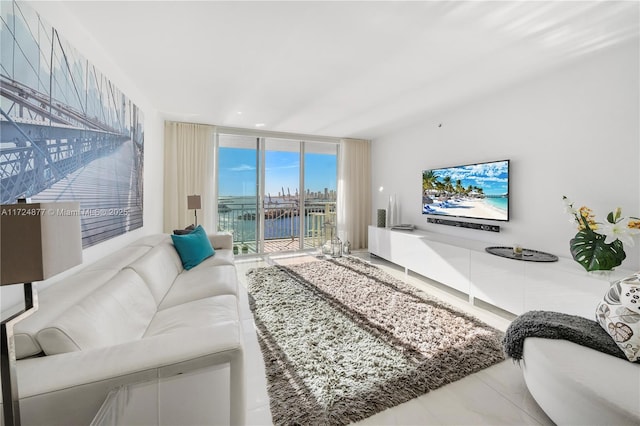 living room with floor to ceiling windows