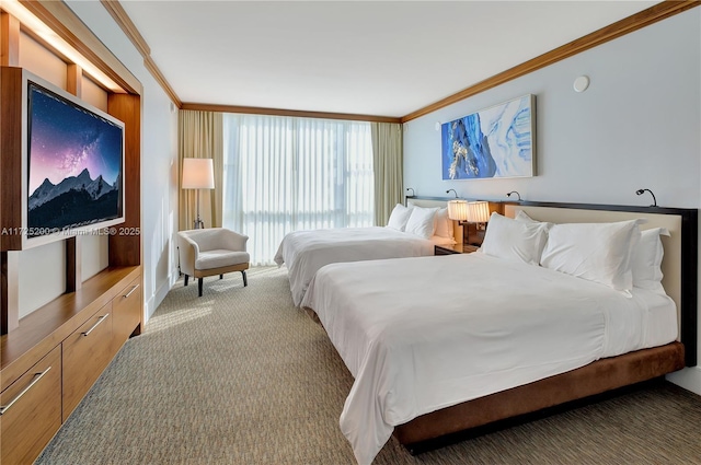 bedroom with ornamental molding and light colored carpet