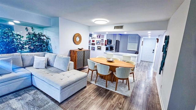 living room with hardwood / wood-style floors