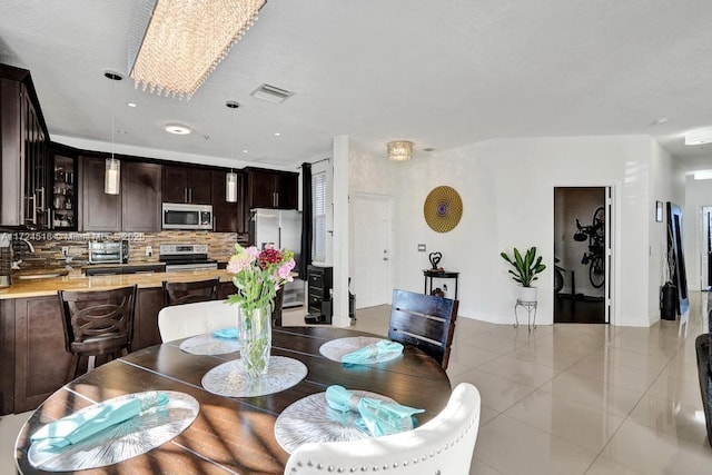 view of tiled dining space