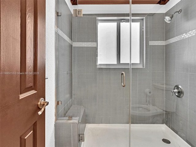 bathroom with an enclosed shower