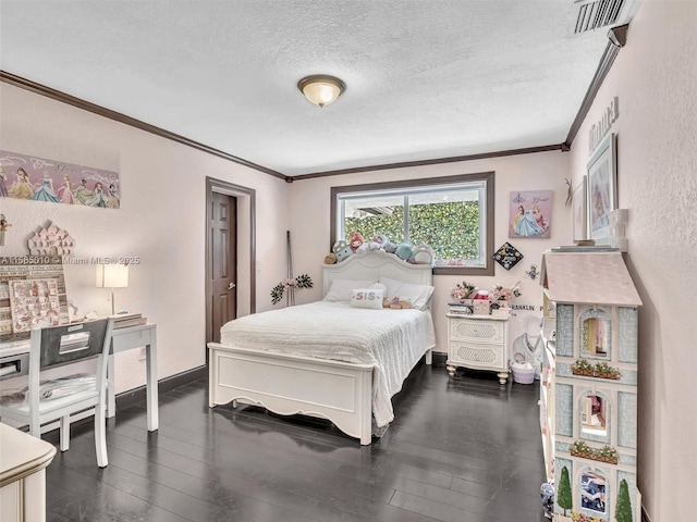 bedroom with a textured ceiling, crown molding, and dark hardwood / wood-style floors