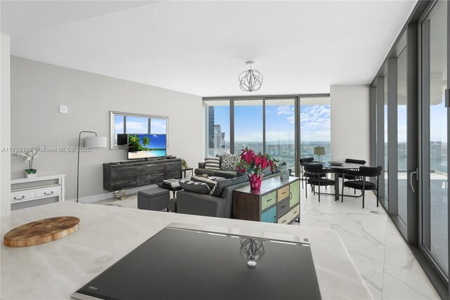 living room featuring expansive windows and plenty of natural light