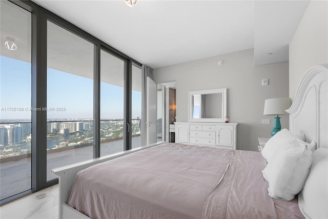 bedroom featuring marble finish floor, access to outside, a water view, and floor to ceiling windows