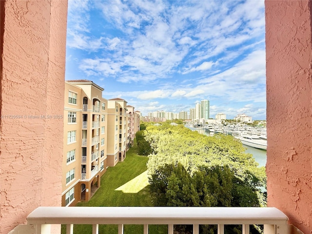 balcony featuring a water view