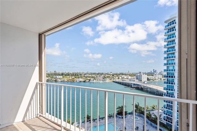 balcony featuring a water view