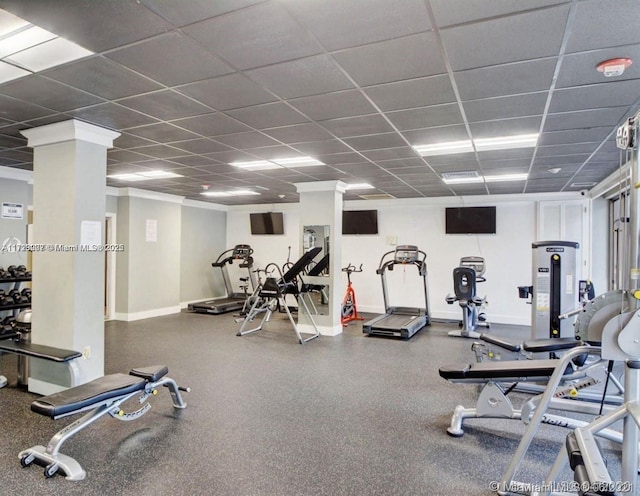 workout area featuring a drop ceiling