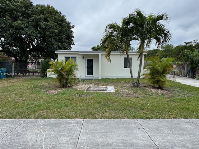 view of front of house with a front lawn