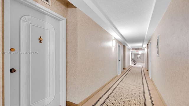 corridor featuring tile patterned floors