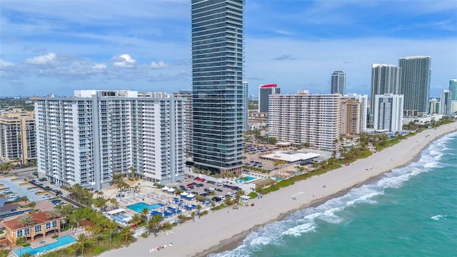 aerial view featuring a beach view and a water view