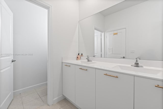 bathroom featuring tile patterned floors and vanity