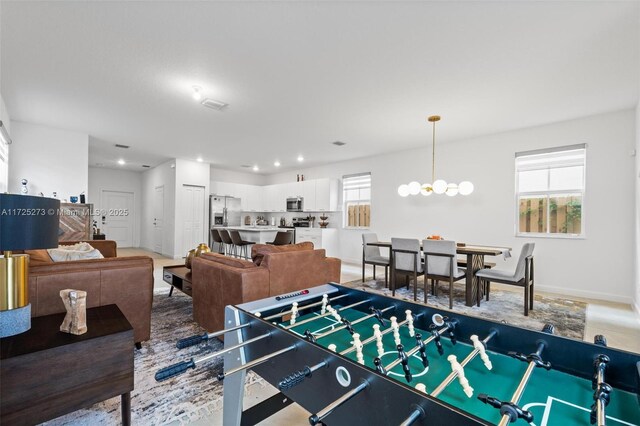 recreation room with a wealth of natural light