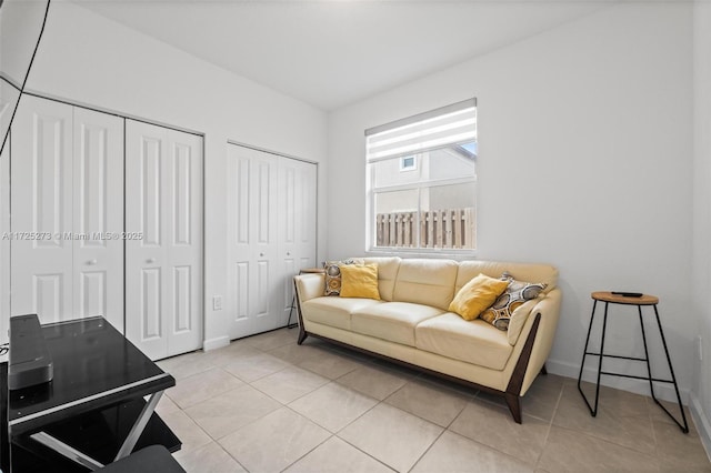 living area with light tile patterned floors