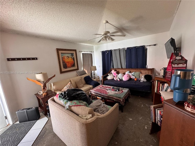 bedroom with a textured ceiling and ceiling fan