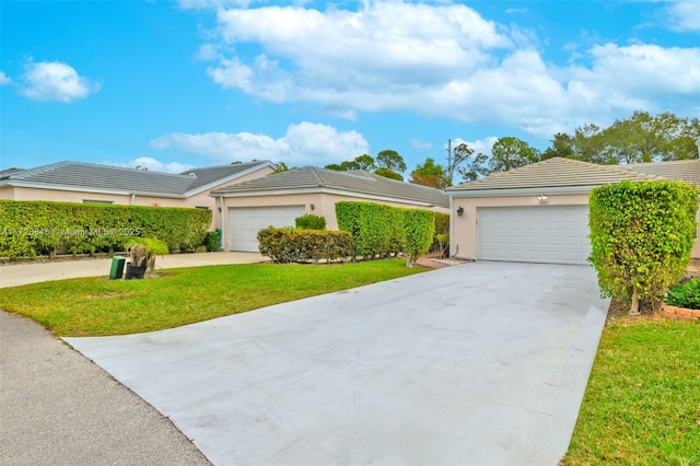 single story home with a garage and a front yard