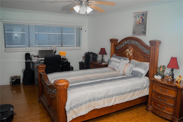 bedroom with ceiling fan, a textured ceiling, hardwood / wood-style flooring, and ornamental molding