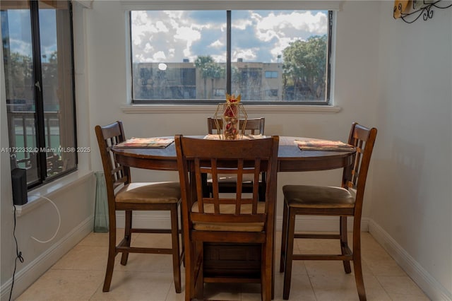 view of tiled dining space