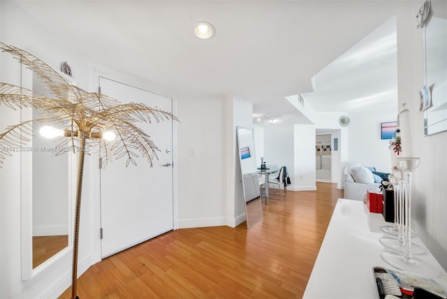 1330 W Ave Unit 1904, Miami Beach, FL 33139 - hall with light wood-style flooring and baseboards
