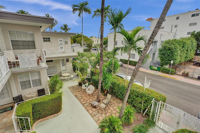 view of home's community featuring a patio area