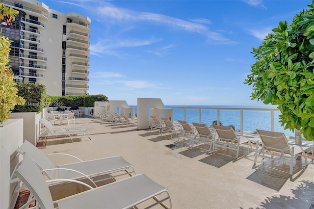 view of patio / terrace featuring a water view