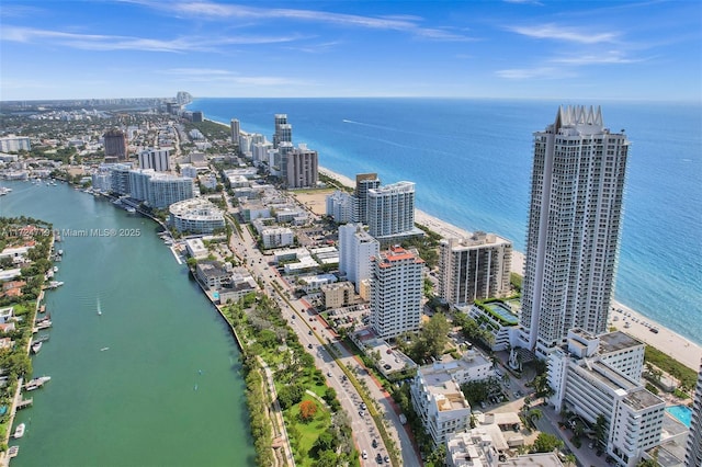 aerial view featuring a water view and a view of city