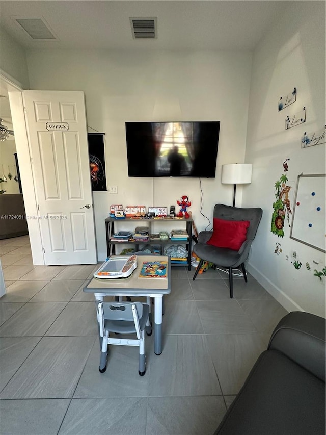 living room featuring tile patterned floors