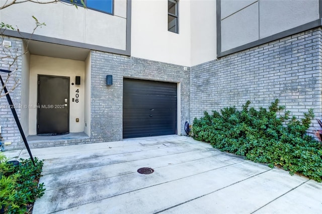 entrance to property featuring a garage