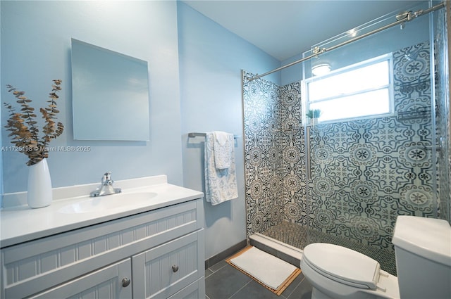 1000 NE 14th Ave Unit 404, Hallandale Beach, FL 33009 - full bath featuring toilet, a tile shower, vanity, and tile patterned flooring