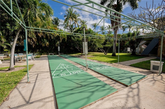 1000 NE 14th Ave Unit 404, Hallandale Beach, FL 33009 - view of community with shuffleboard and a yard