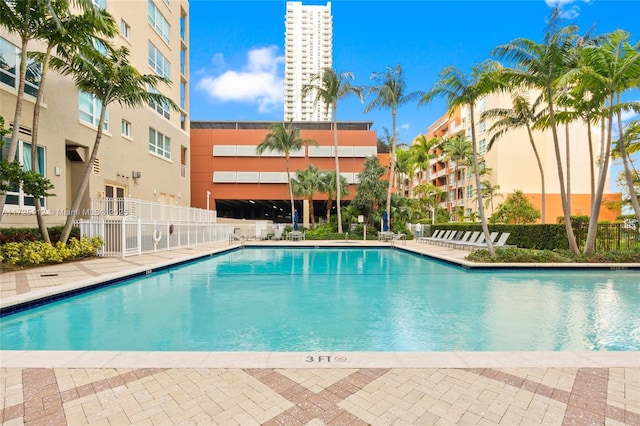 view of swimming pool with a patio area