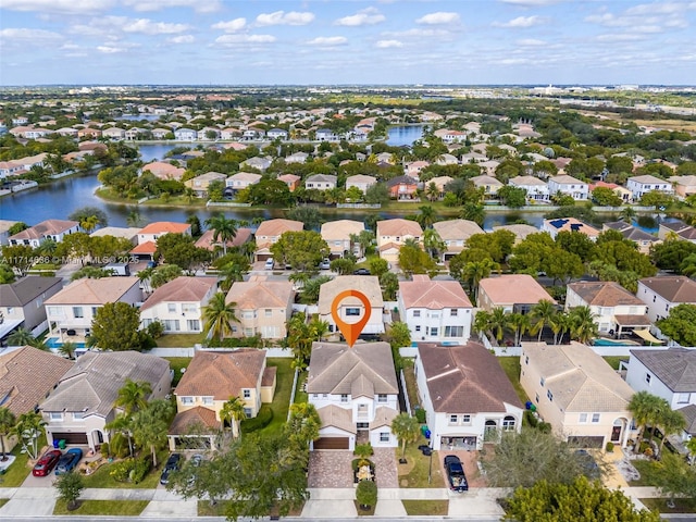 drone / aerial view with a water view