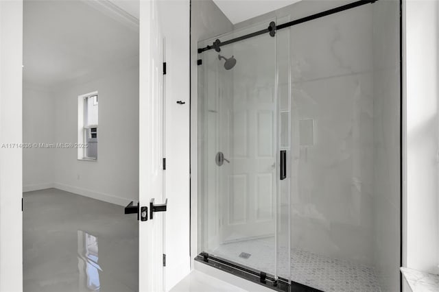 bathroom with a shower with shower door