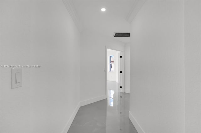 corridor featuring ornamental molding and a wealth of natural light