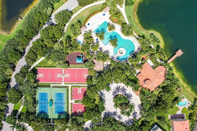 birds eye view of property with a water view