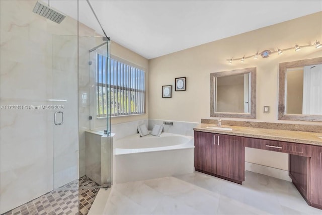 bathroom with shower with separate bathtub, tile patterned floors, and vanity