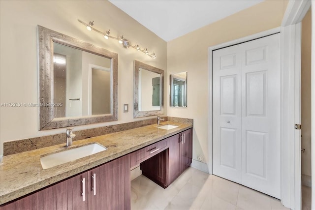 bathroom featuring vanity and tile patterned floors