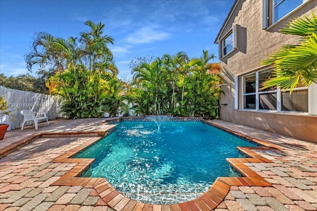 view of pool featuring a patio and pool water feature