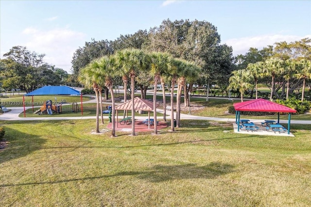 view of playground with a yard and a gazebo